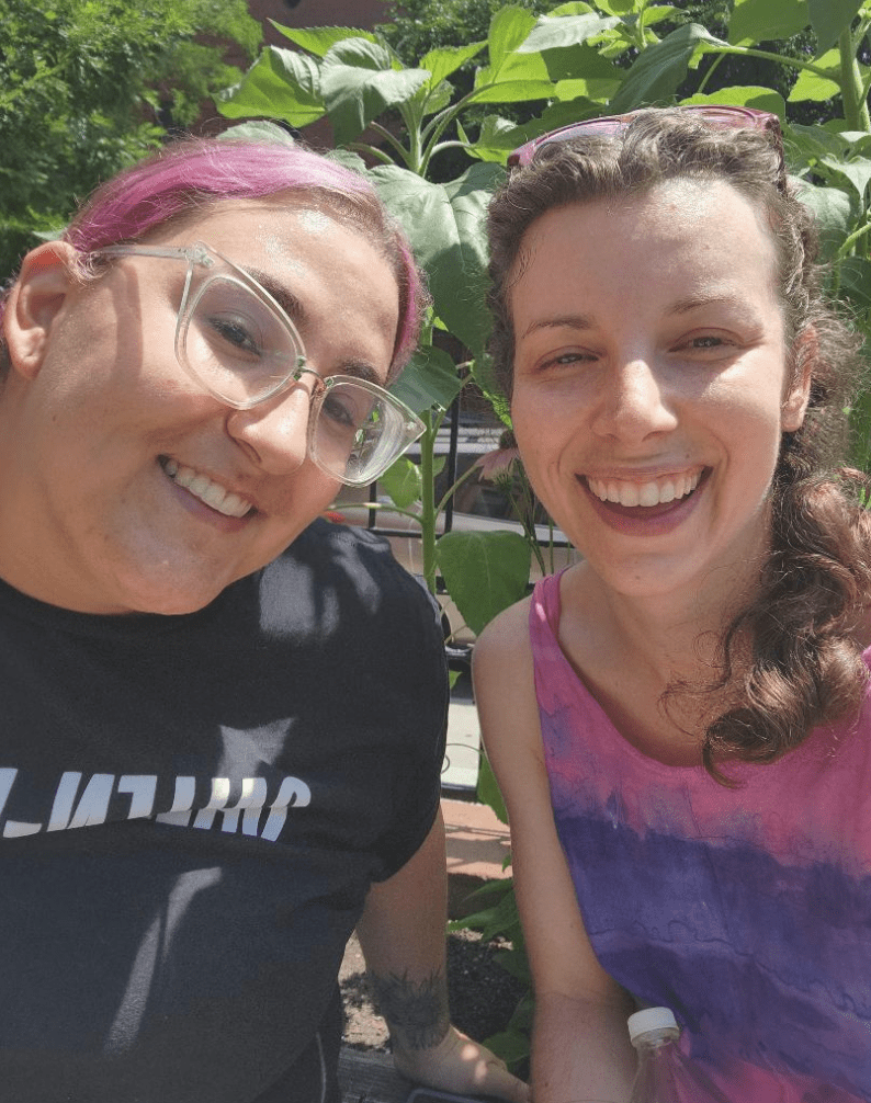 Doulas Lauren with pink hair and Bryen in pink / purple tie dye